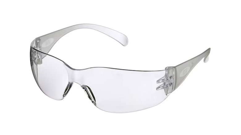 A stock image showing a pair of clear safety glasses
