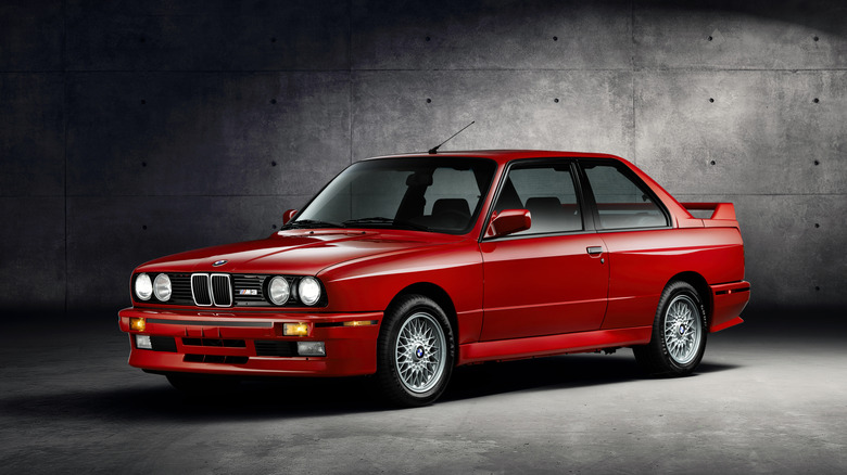 Red BMW E30 M3 front 3/4 view