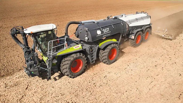 A Xerion 5000 tilling farmland