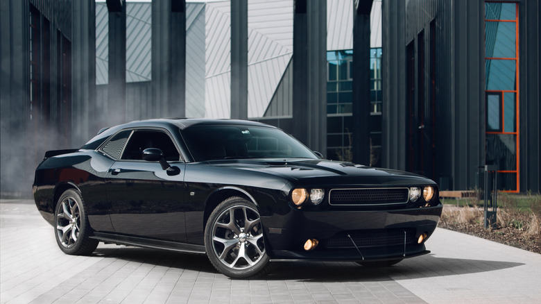 A front right-quarter view of a black 2020 Dodge Challenger Demon on pavement.