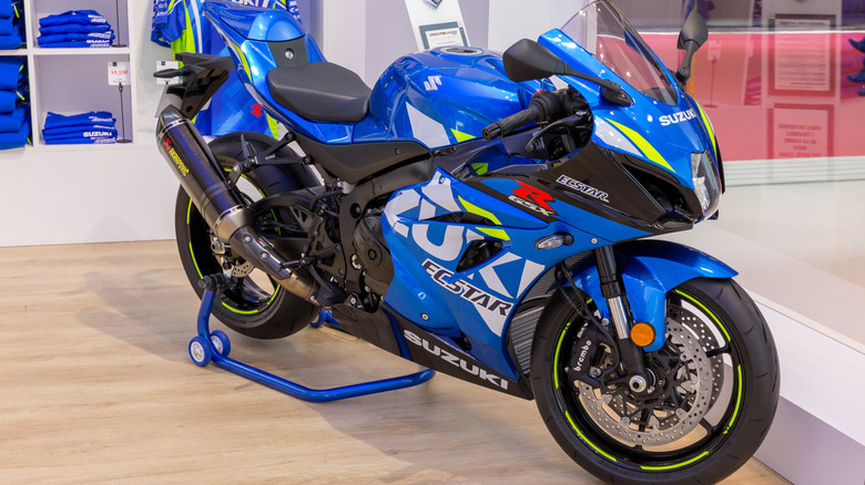 Suzuki GSX-R1000R in race livery on display at a motor show