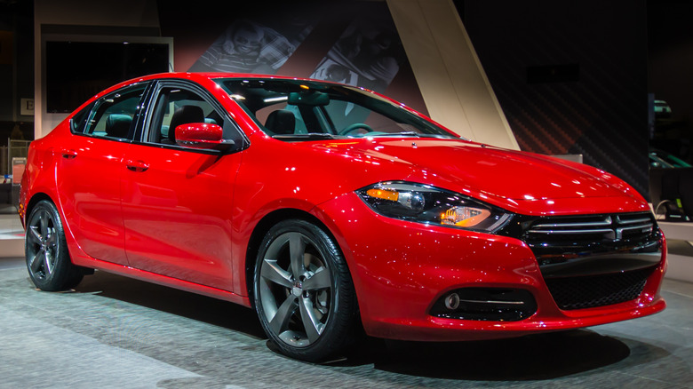 red 2013 Dodge Dart at an auto show