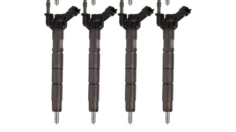 A group of fuel injectors for an LML engine on a white background.