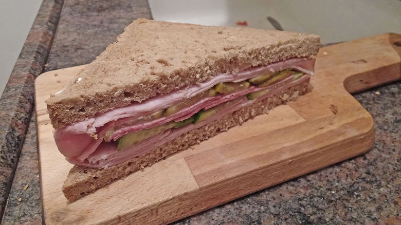 A sandwich on a cutting board