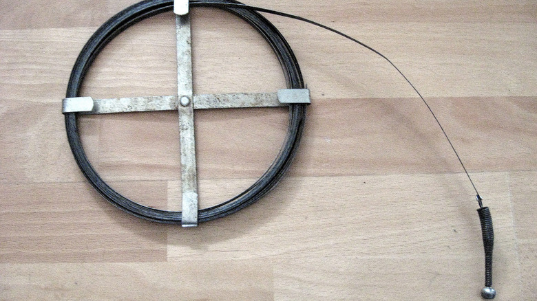 A plumbing snake for clearing drains