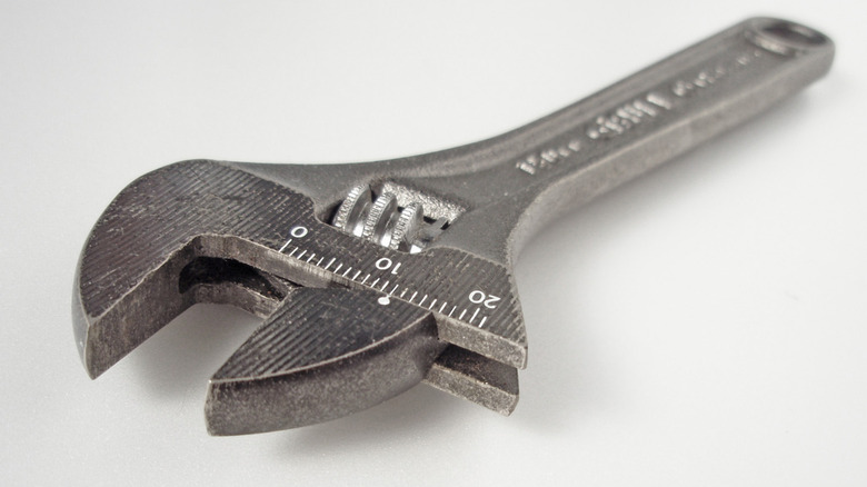 A spanner wrench against a white background