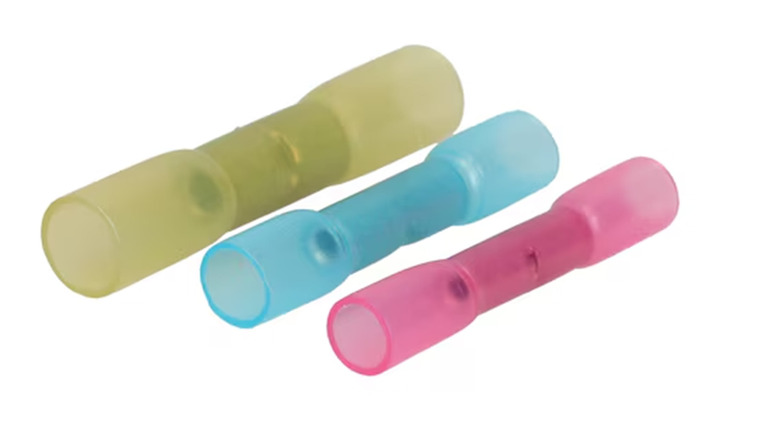 Three heat sink connectors in yellow, blue, and red