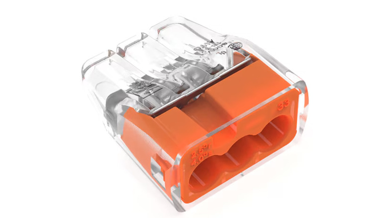 A push-in wire connector with 3 wire holes