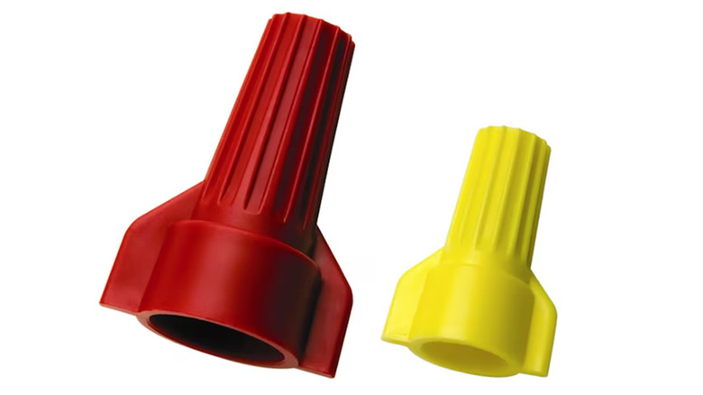 Two winged twist-on style wire connectors in red and yellow