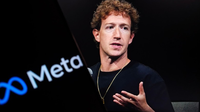 Mark Zuckerberg talking at an event, Meta logo visible in the background.