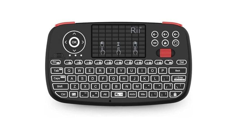 Small keyboard trackpad combination on white background