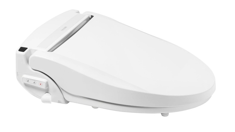 Toilet seat with built-in bidet