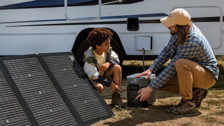 Solar powered generator beside RV