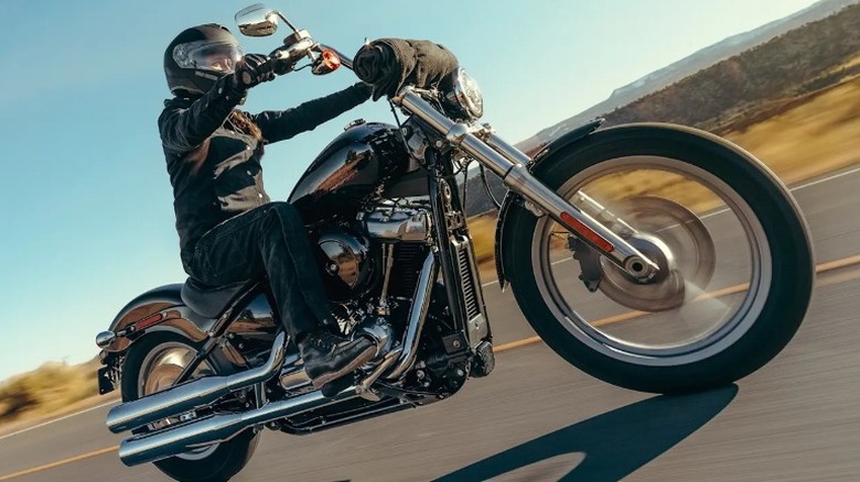 A man on a Harley-Davidson Softail Standard Motorcycle