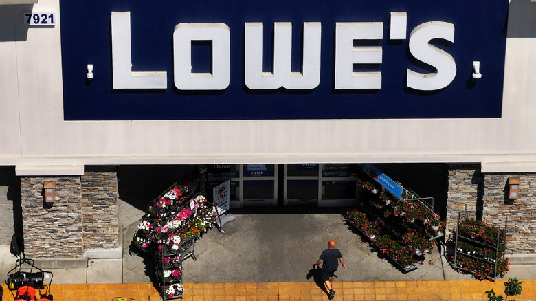 customer and Lowe's store entrance from above