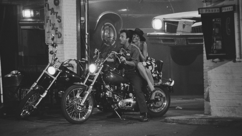 Billy Joel and christie brinkley on a motorcycle