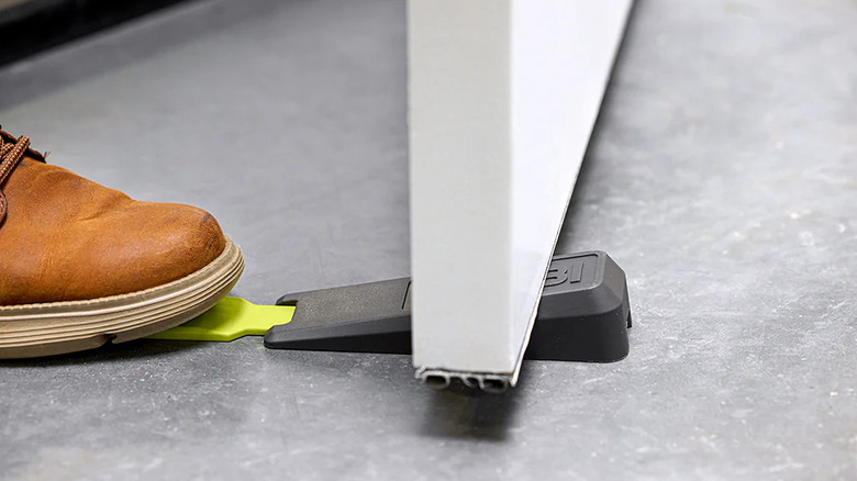 A boot keeping the Ryobi Door Stabilizer in place