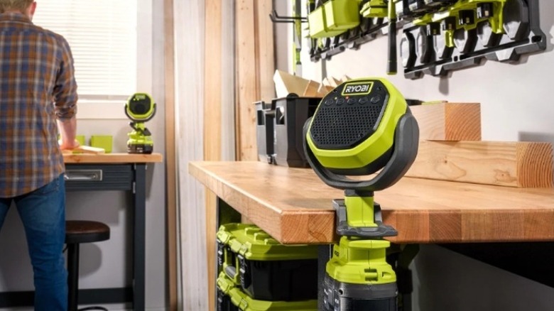 Speaker clipped onto a work surface