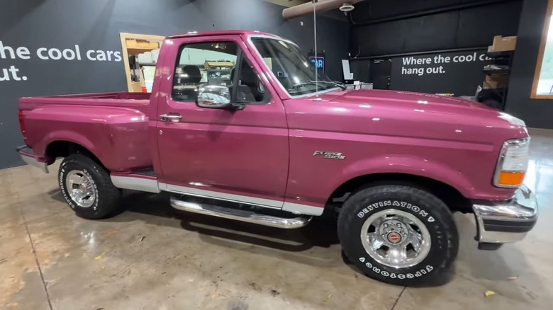 Iris Metallic F150 parked inside