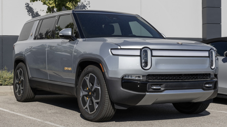 A gray Rivian R1S parked