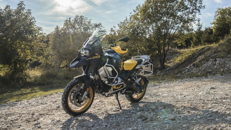 BMW R 1250 GS parked on gravel front 3/4 view