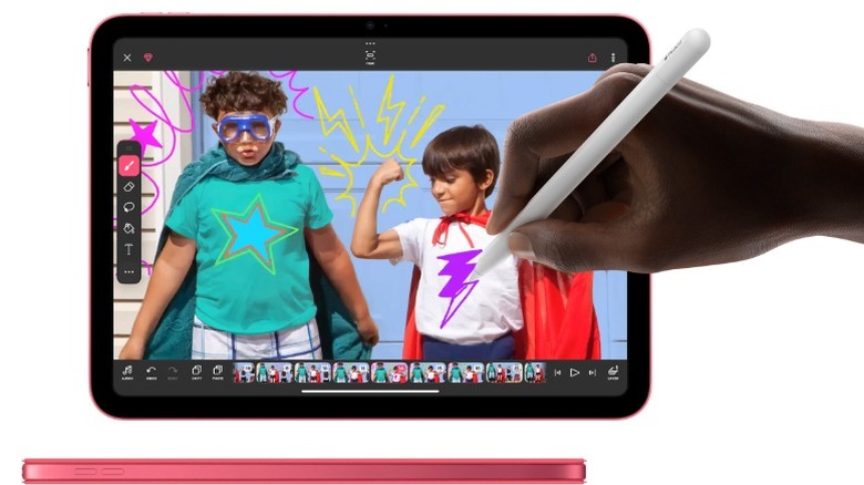 A hand using an Apple Pen on an iPad