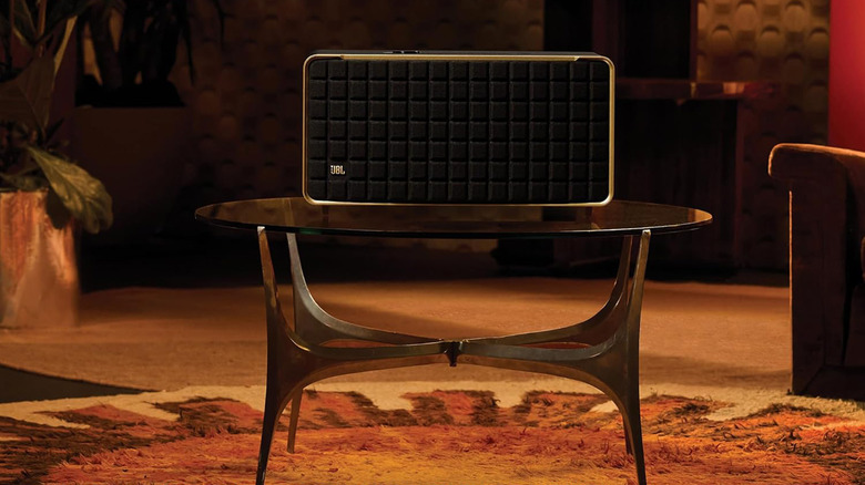 A JBL Authentics 500 speaker on a fancy glass table