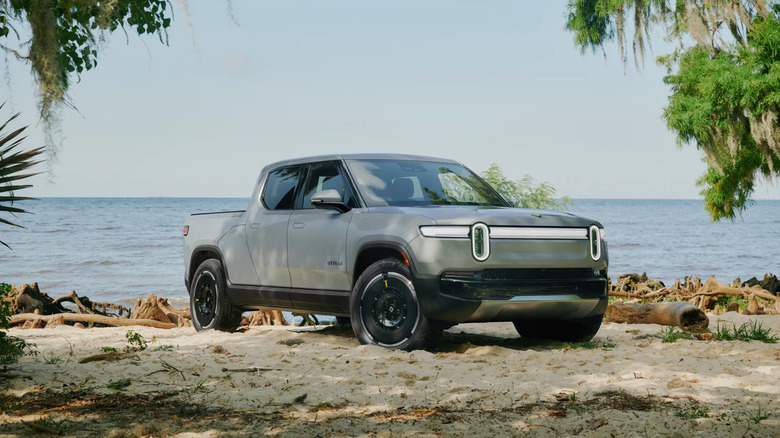 A side on shot of a 2025 Rivian R1T Parked