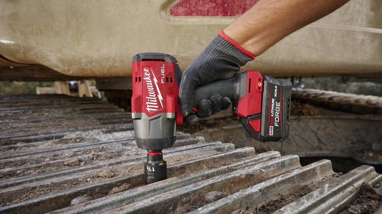 Milwaukee 2967-20 M18 Fuel 1/2 Inch High Torque Impact Wrench in action
