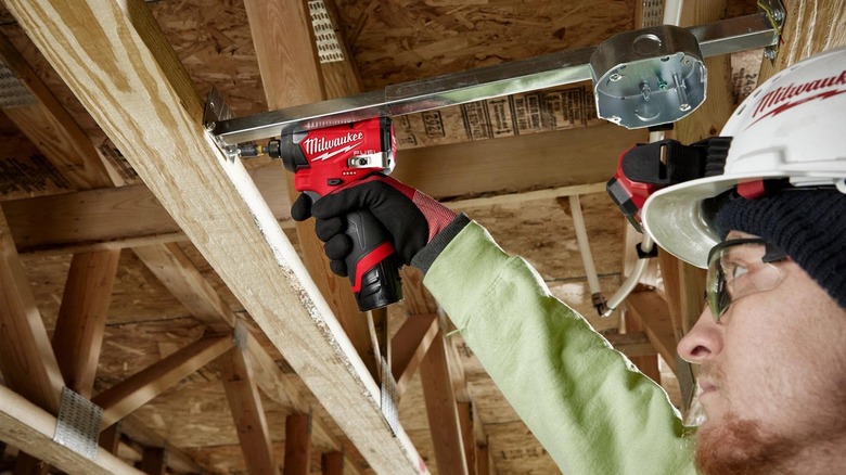 Milwaukee 3453-20 12V Fuel 1/4" Impact Driver on a jobsite