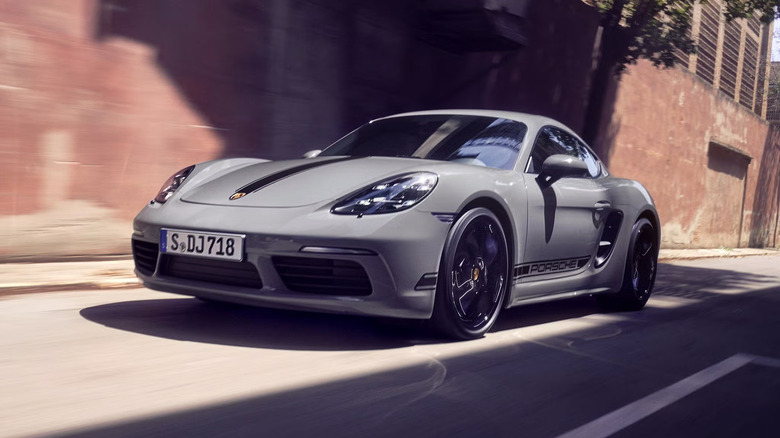 A gray 2025 Porsche 718 Cayman driving