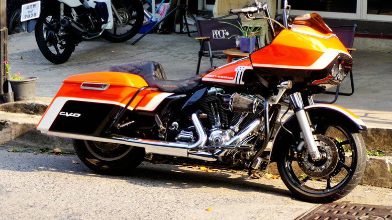 A Harley-Davidson CVO bike parked at the side of a road a show in Thailand