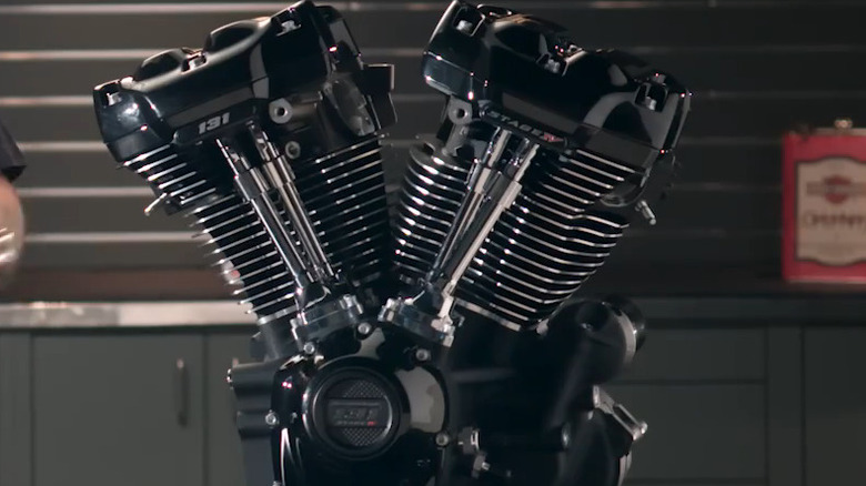 A black, matte finished Milwaukee Screamin' Eagle 131 ci engine on a table