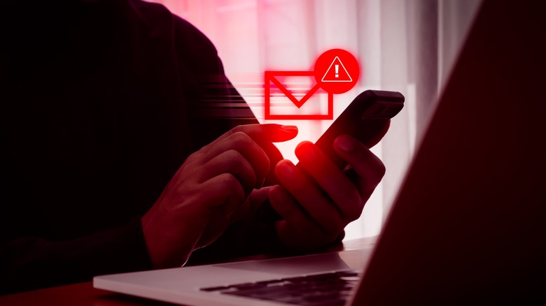 Email holographic symbol above smartphone