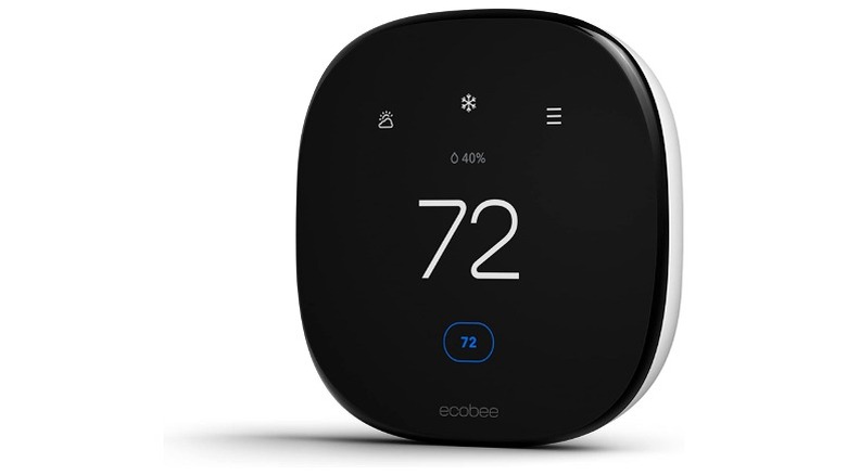 Black thermostat showing a temperature of 72 degrees