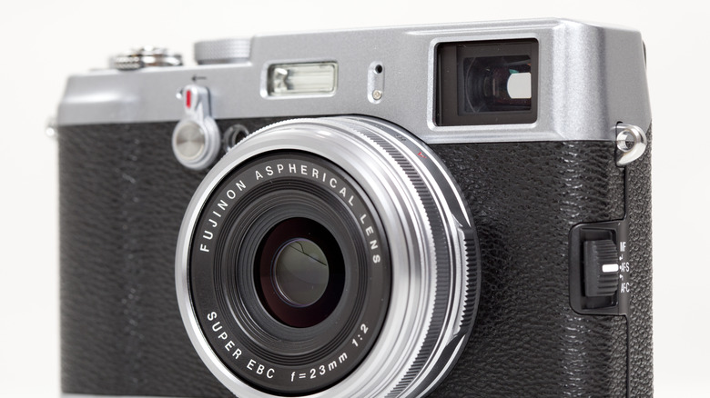 Old fashioned camera white background