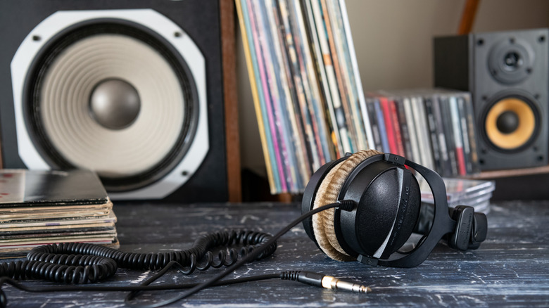 Desk with speakers and headphones