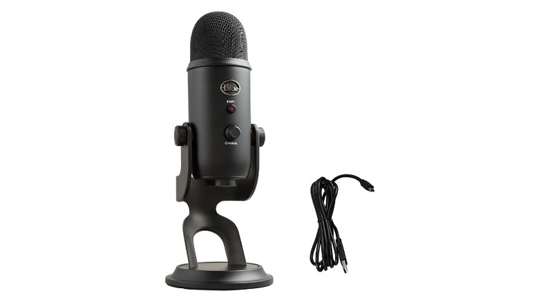 Black mic on stand and USB cable