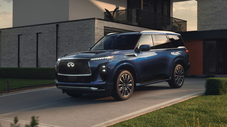 A blue 2025 Infiniti QX80 parked