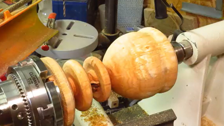 Wooden goblet being formed on a wood lathe