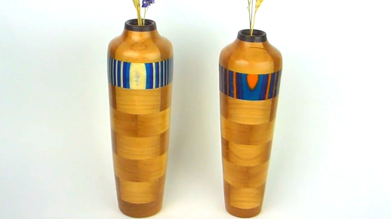 Colorful segmented vases with a white background