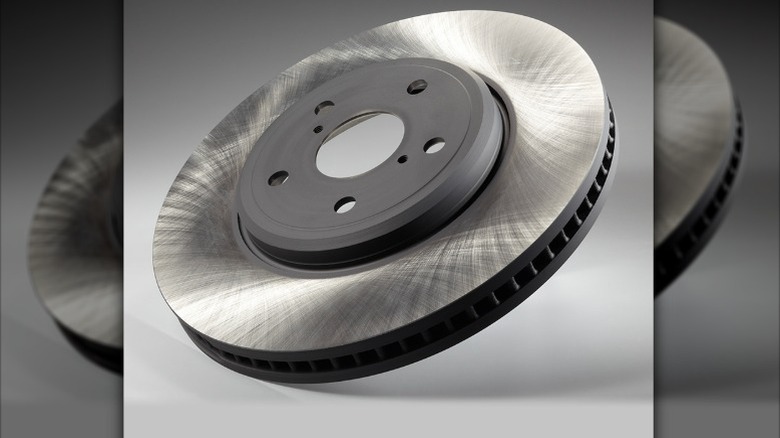 ADVICS vented disk brake rotor against a white background.