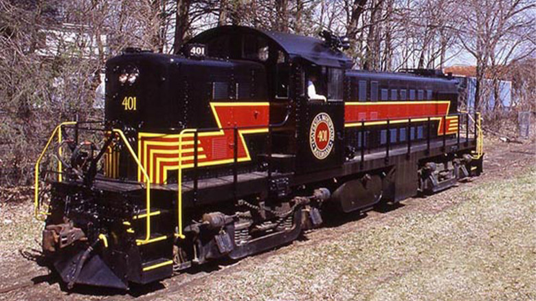 The CMRR Alco RS-1 No. 401 train engine near some trees