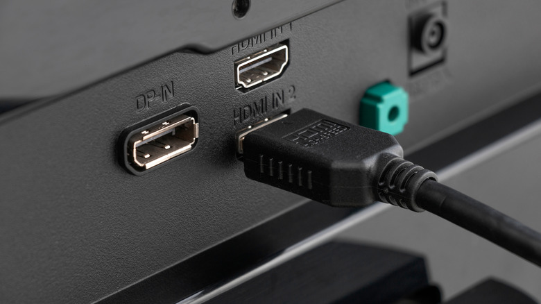 Close up of HDMI cable connected to device.