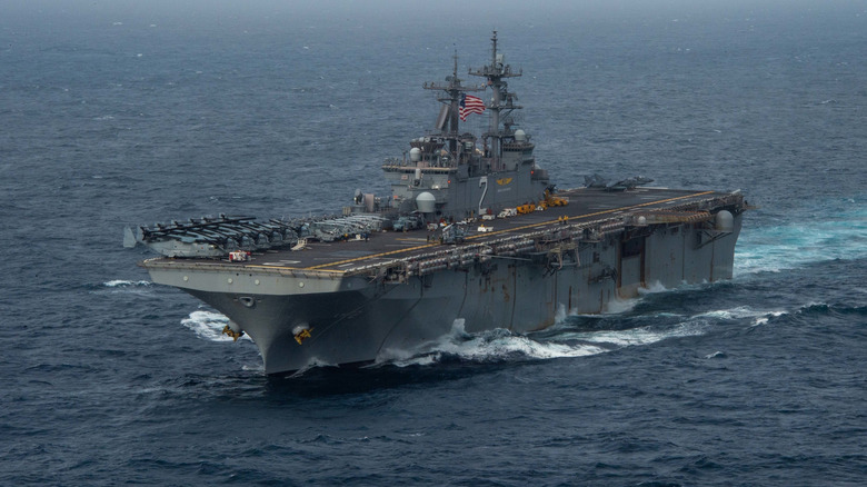 Wasp-class LHD ship USS Essex seen from port front view transiting the Arabian Sea