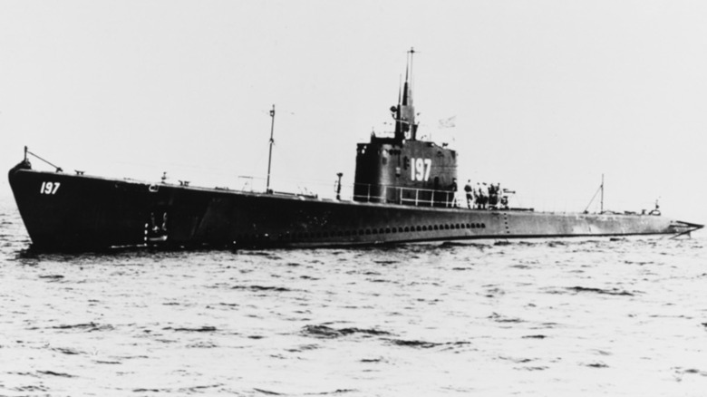 Black & white photo of USS Seawolf surfaced in the middle of the ocean