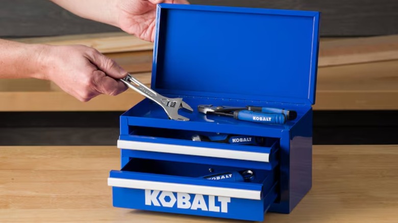 a Kobalt mini tool box holding tools