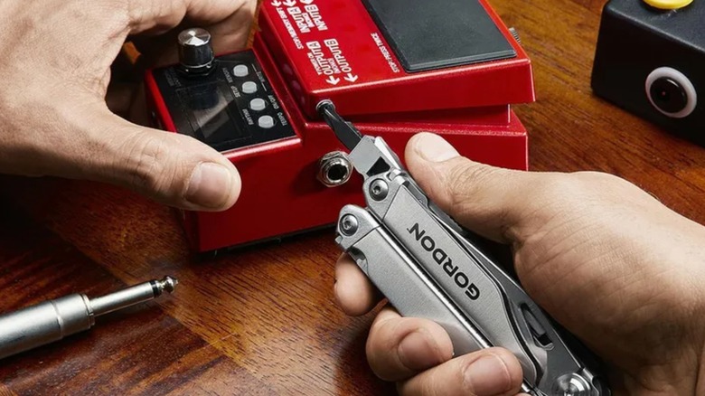 Using a Gordon Multi-Tool to repair a guitar pedal