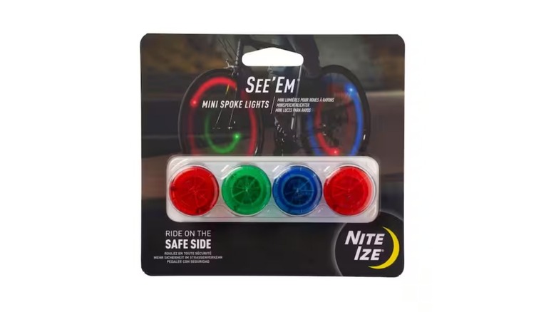 Package of four round colored lights made for bicycle tires