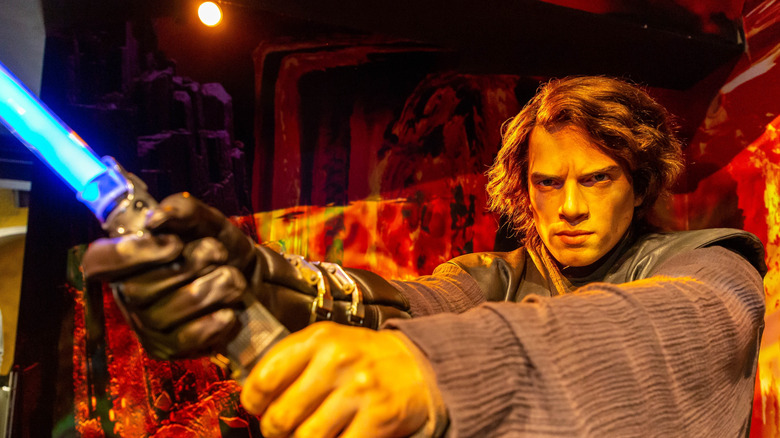 Life-sized wax image of Anakin Skywalker holding a lightsaber